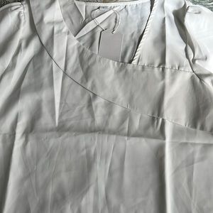 Lightweight asymmetrical neckline blouse